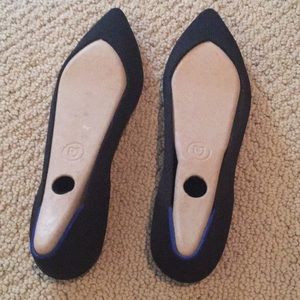 Rothy’s Black pointed toe shoes. Size W8